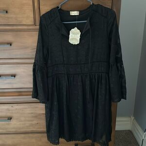 Black, knee length dress
